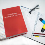 le code général de la fonction publique posé sur un bureau avec un agenda et des stylos
